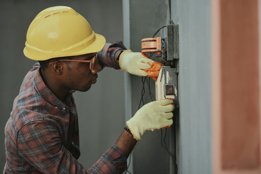 Technician at work on an electrical panel
