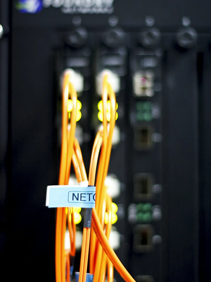 A technician wiring an installation